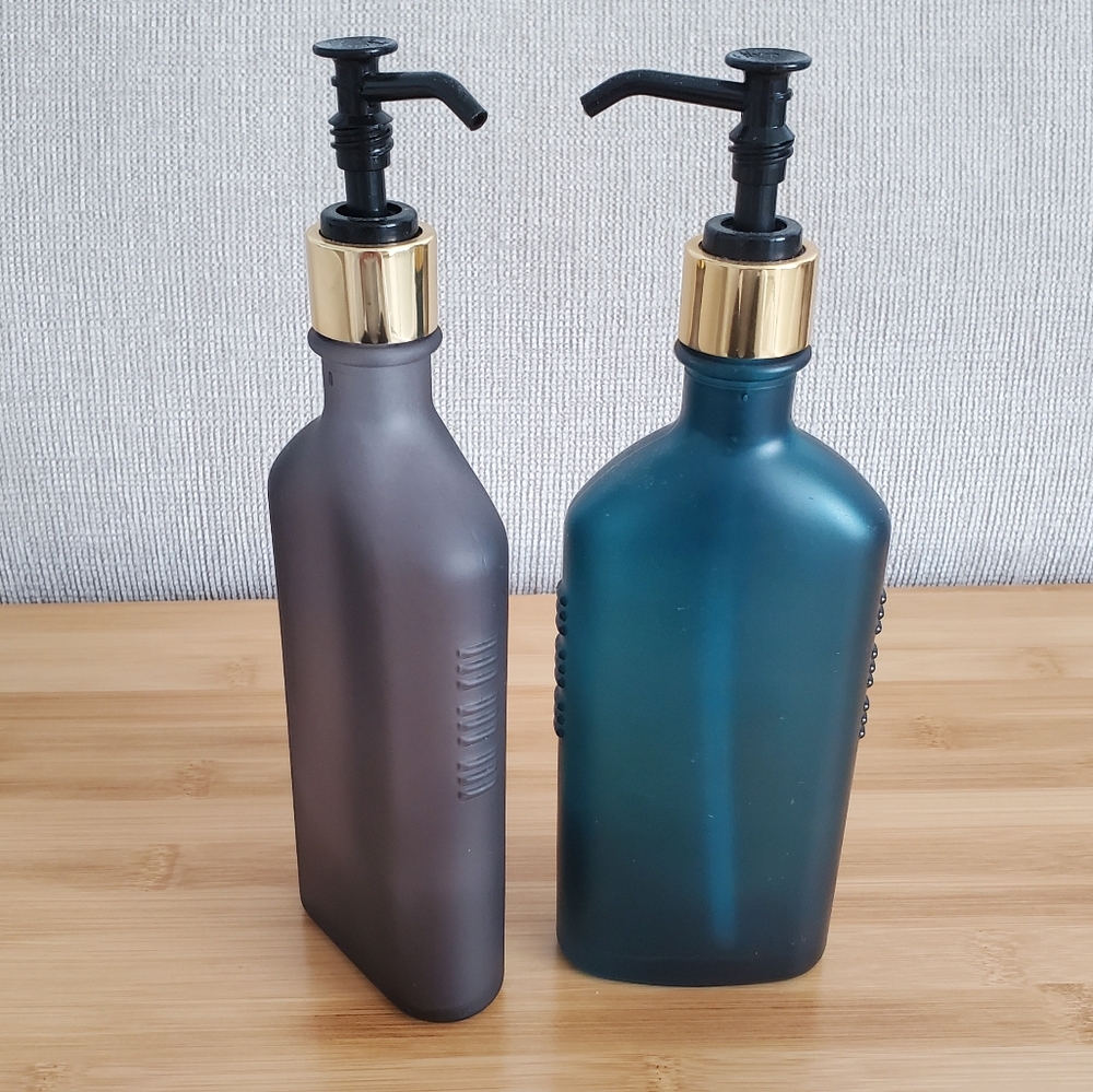 Empty opaque colored glass bottles
